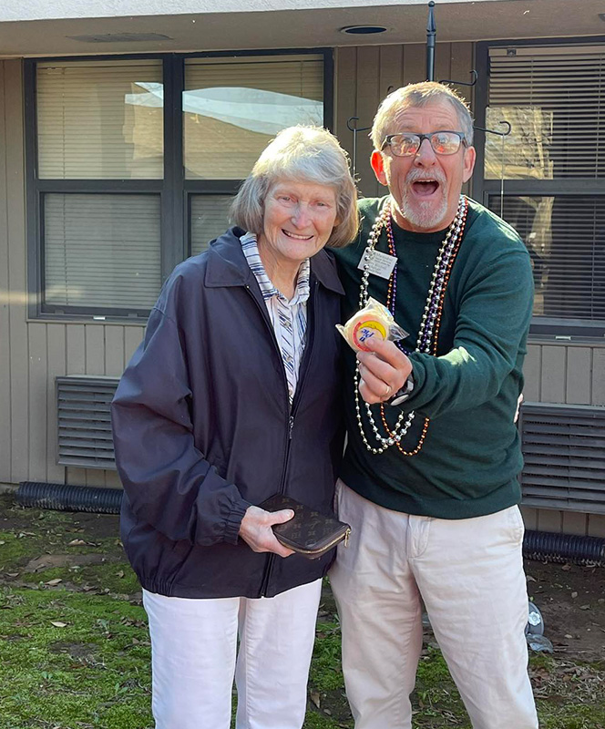 Two residents enjoying a fun moment outdoors.