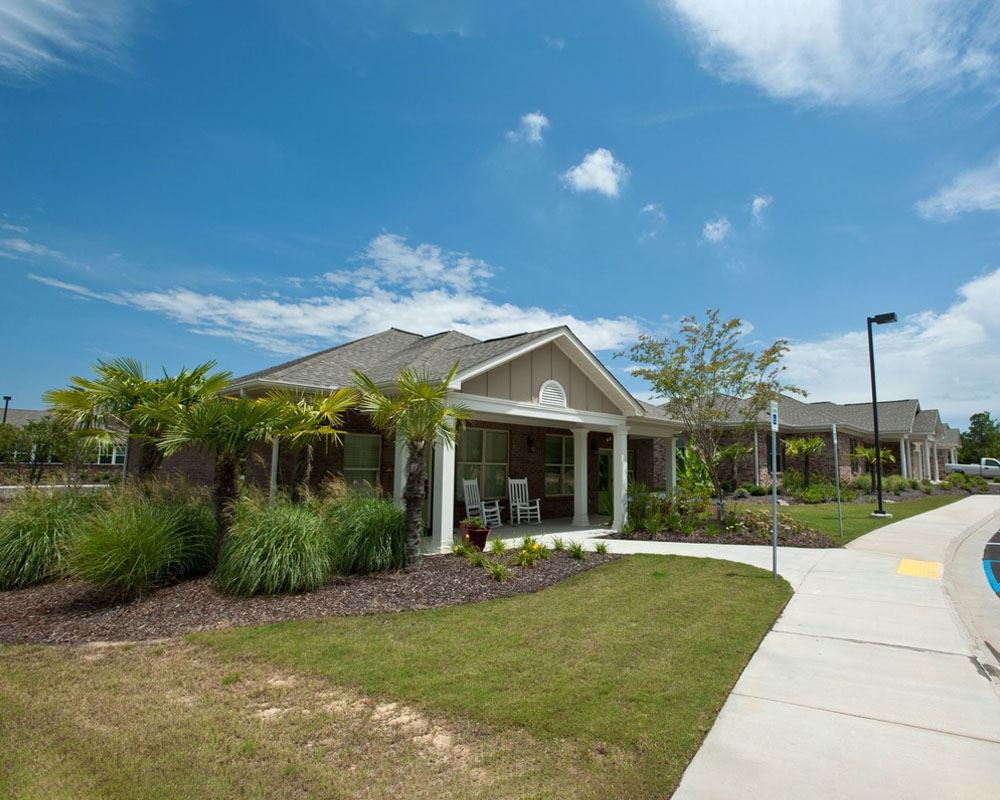 Exterior view of the facility surrounded by landscaping.
