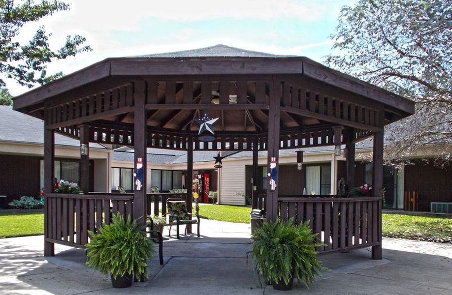 Outdoor gazebo in a landscaped area