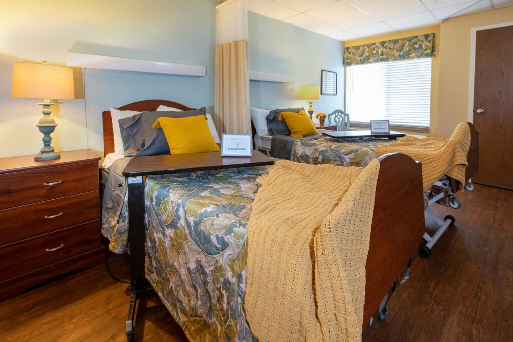 Cozy shared resident room with beds and decor