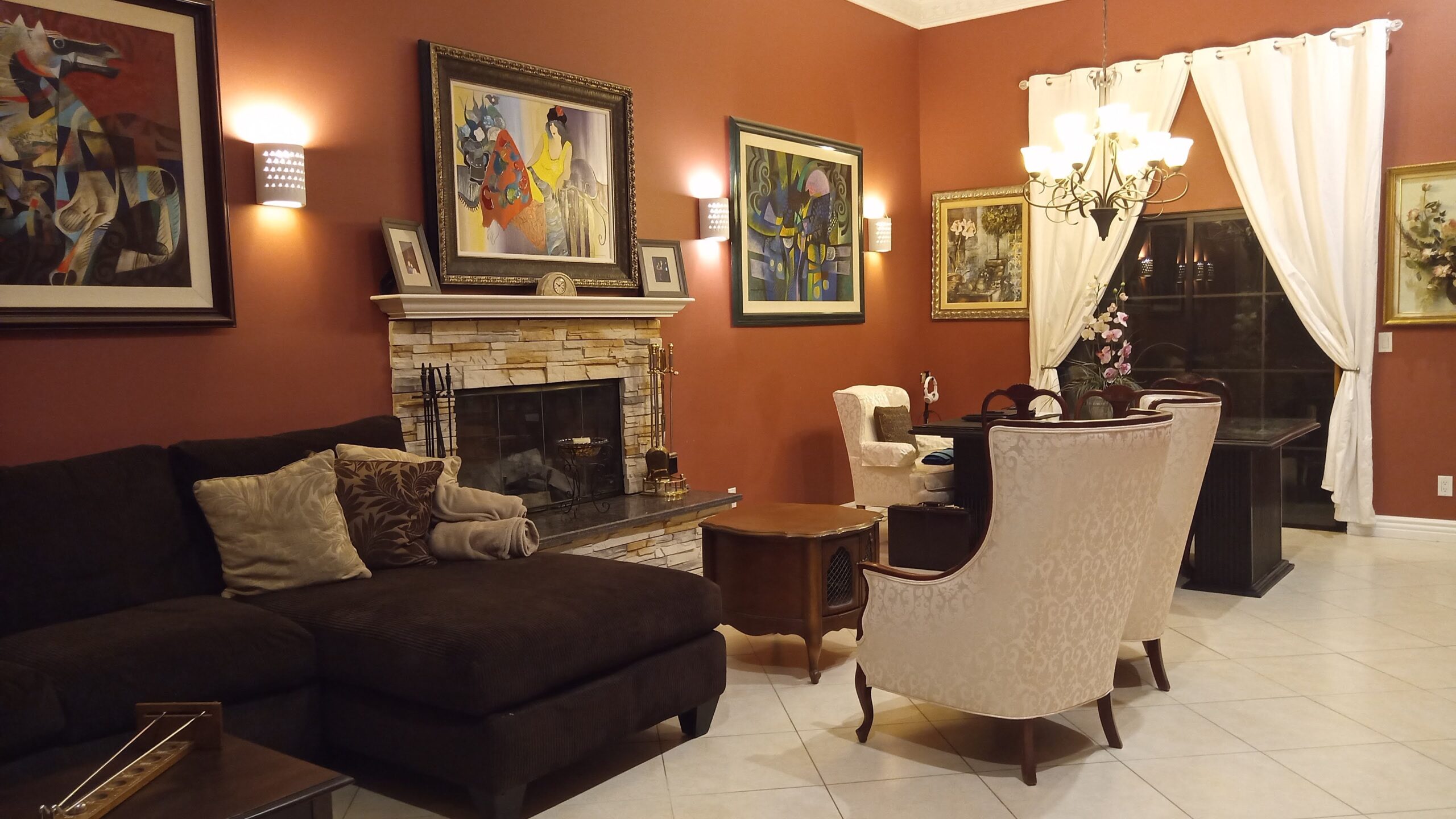 Cozy lounge area with comfortable seating and artwork.