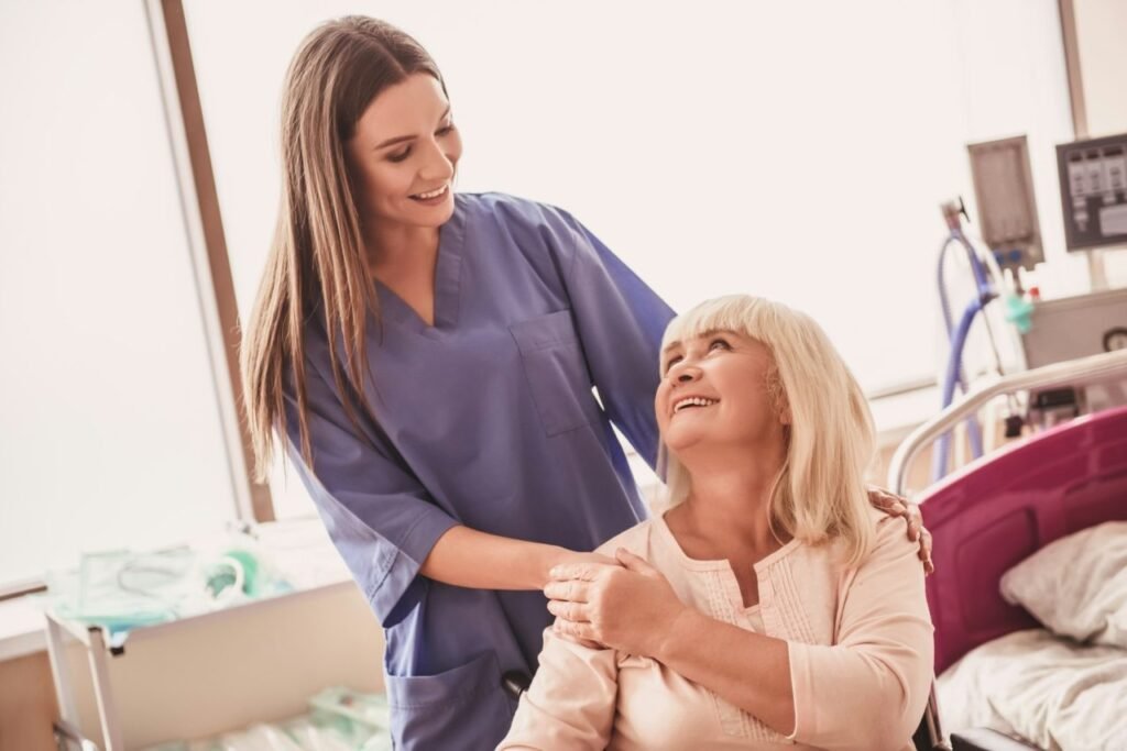 Caregiver interacting with a resident in a room.