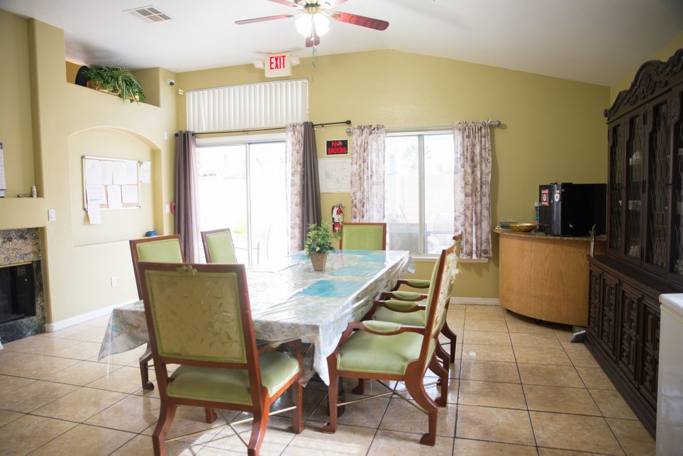 Dining area with a large table and seating