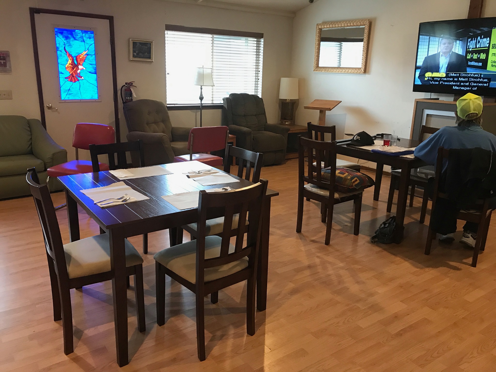 Common area with seating and TV in the facility