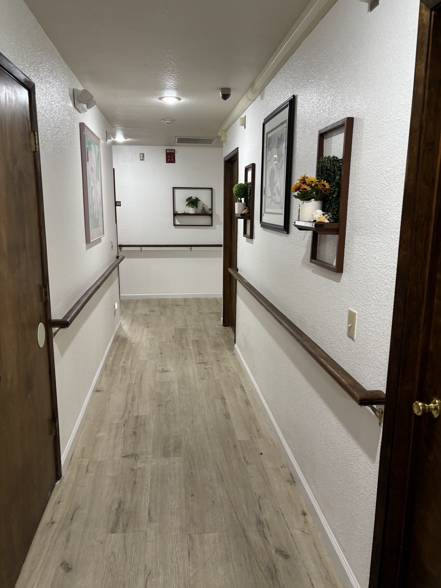 Brightly lit corridor in a senior care facility