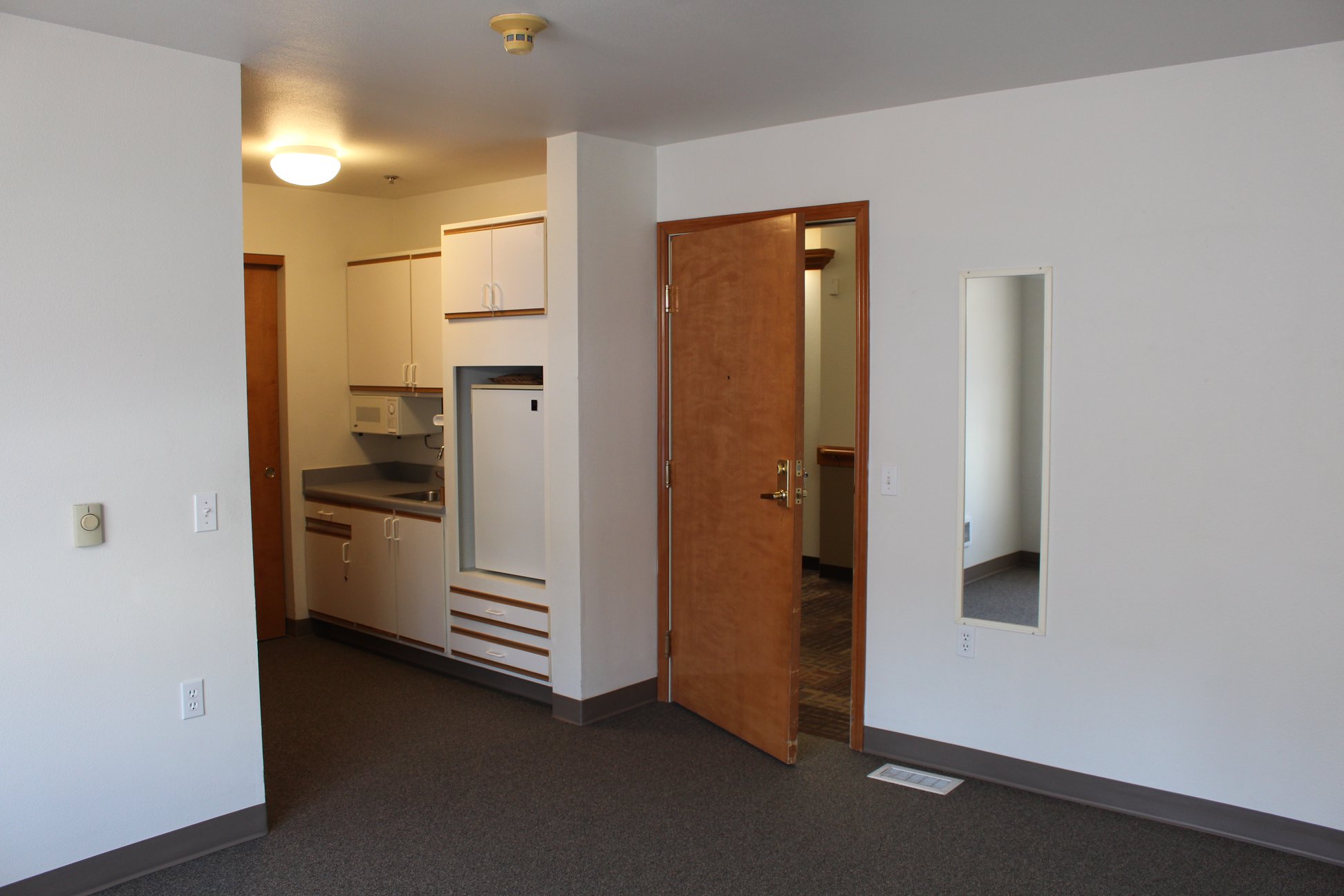 Interior of a resident room with kitchenette