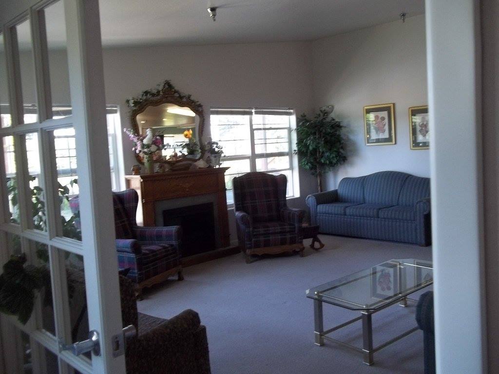 Cozy common area with seating and fireplace