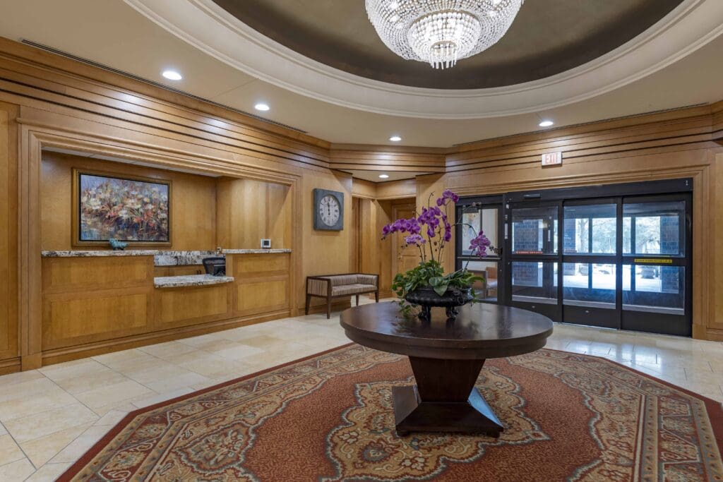 Interior view of a welcoming lobby with decorative flowers