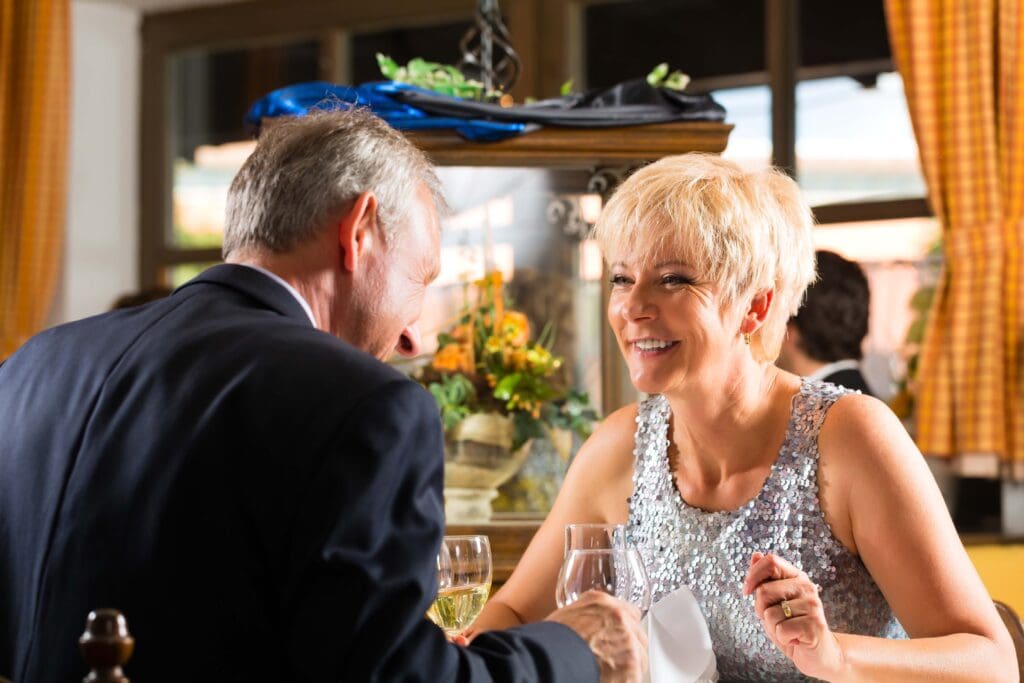 Couple enjoying dinner at a dining area