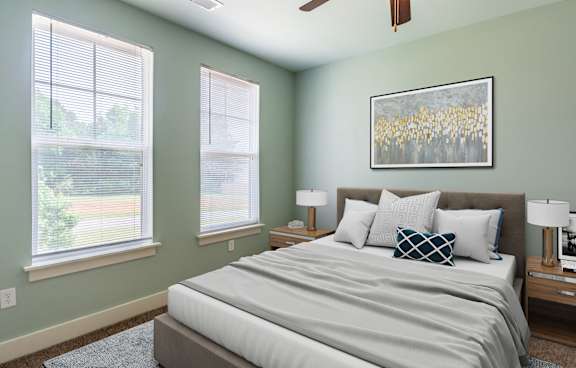 Cozy private bedroom with natural light and decor