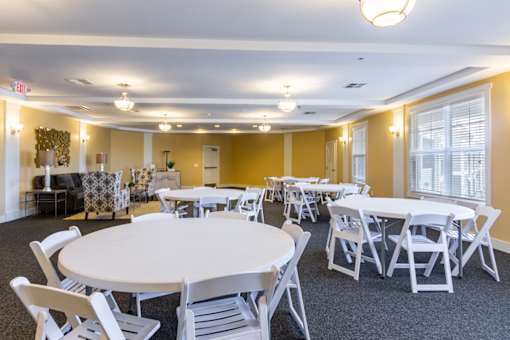Bright common area with tables and chairs