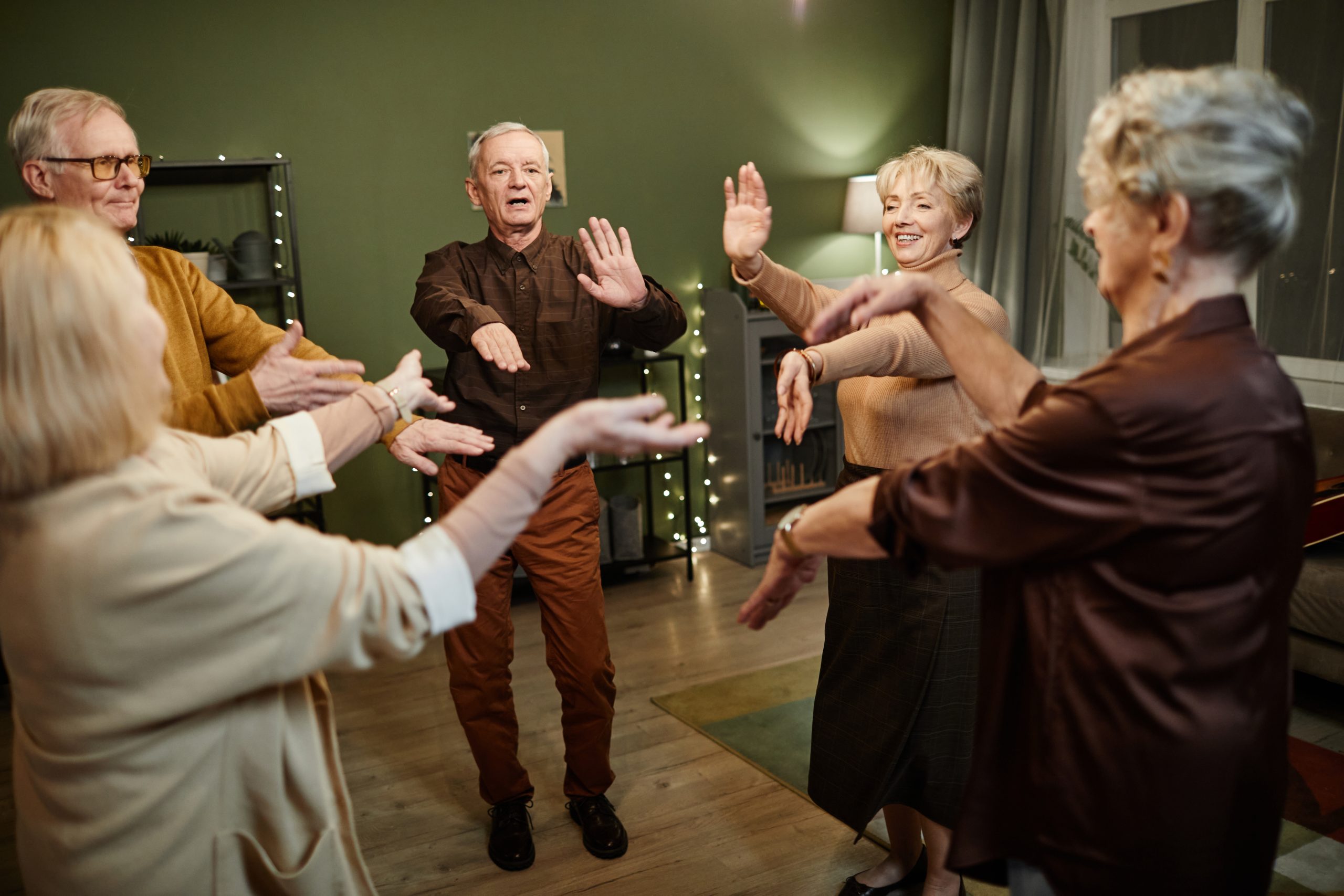 Seniors participating in a group activity indoors