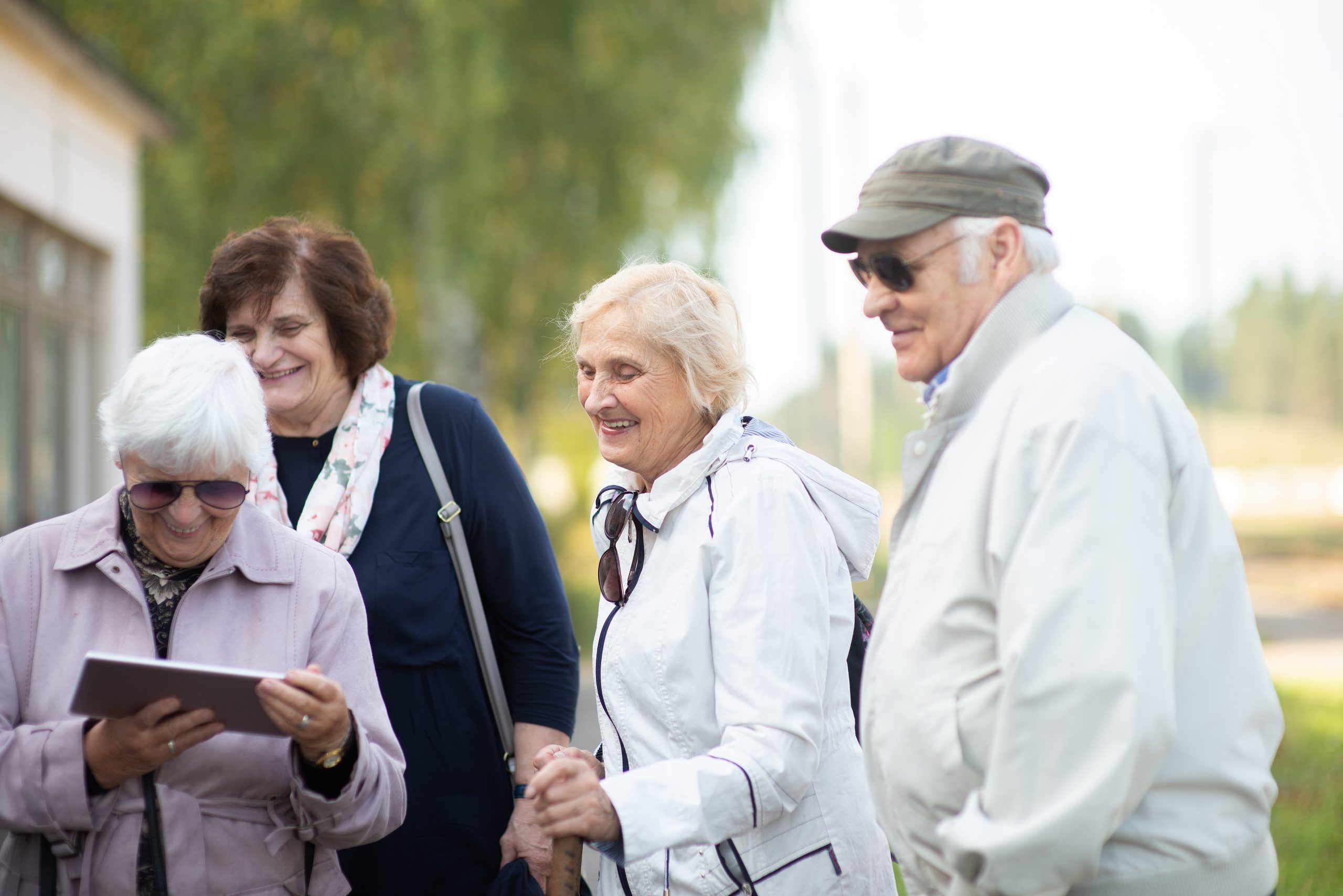 Group of seniors sharing a moment outdoors