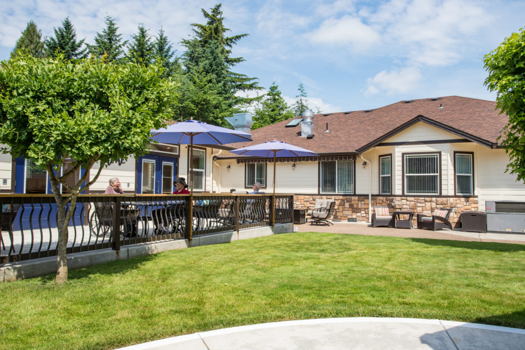 Outdoor patio area with people enjoying the space.