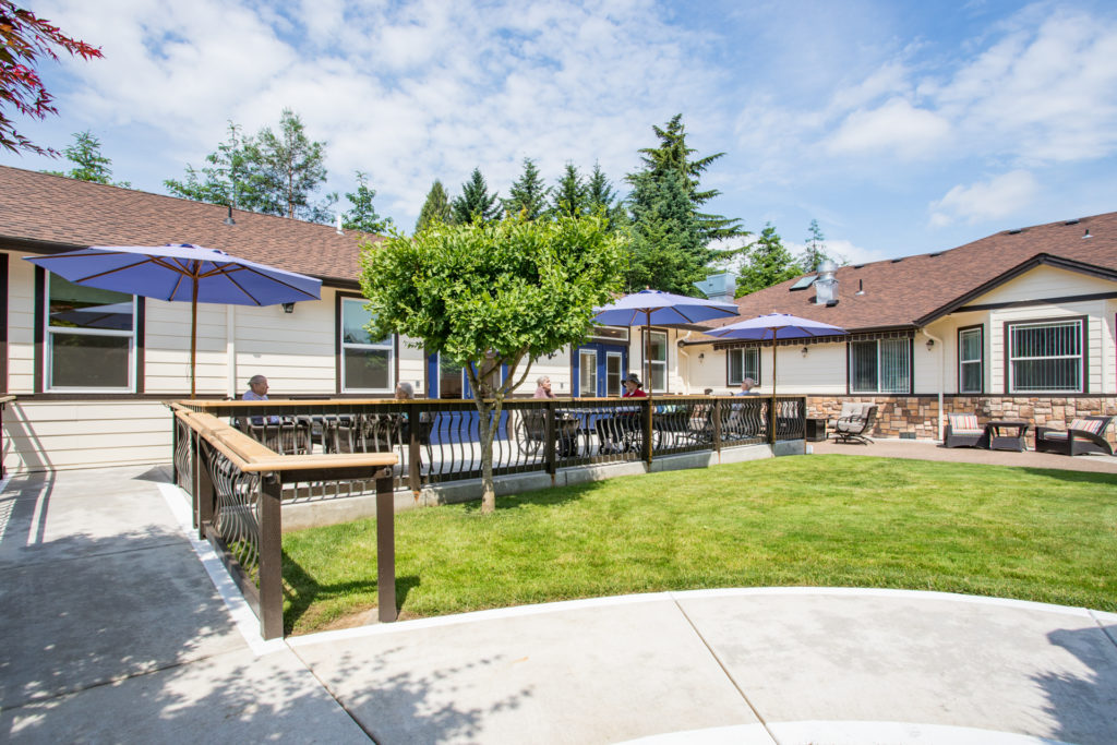 Outdoor area with seating and umbrellas