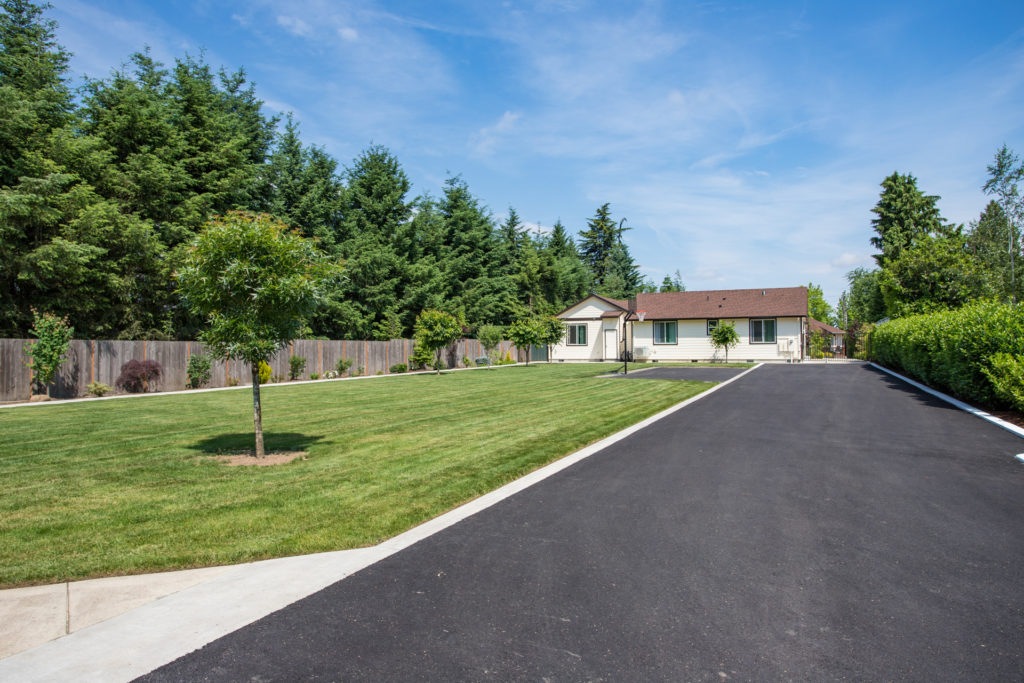 Exterior view of a facility with manicured lawns.