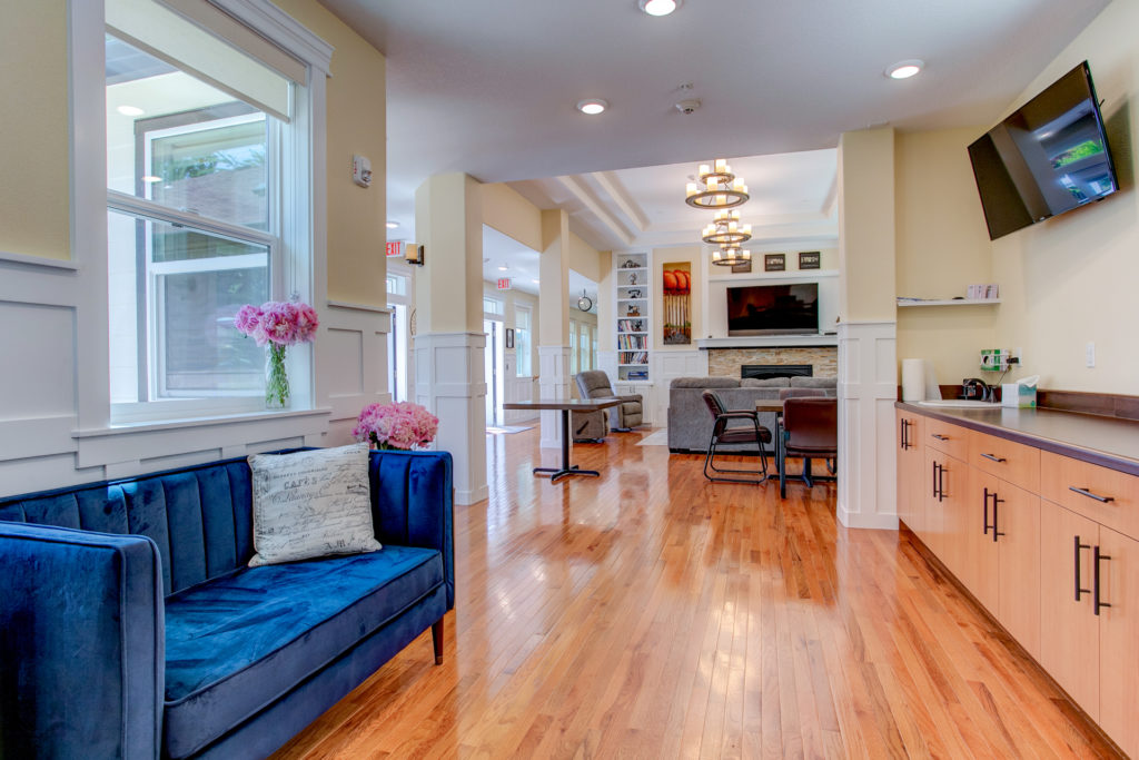 Bright common area with comfortable seating and modern decor.