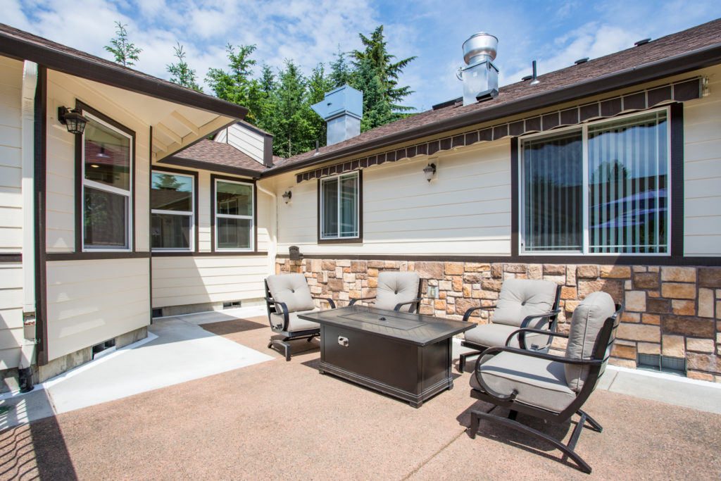 Outdoor seating area with patio furniture