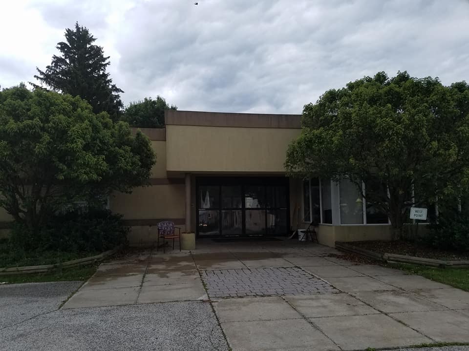 Entrance of a care facility with landscaped front