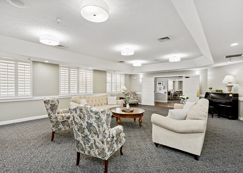 Common area with seating in a warm interior setting