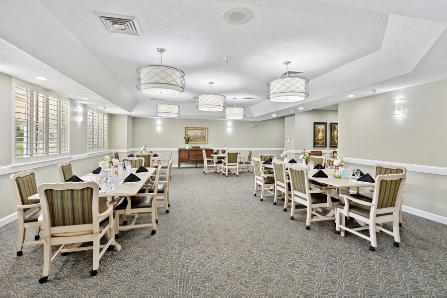 Bright dining area with tables set for meals