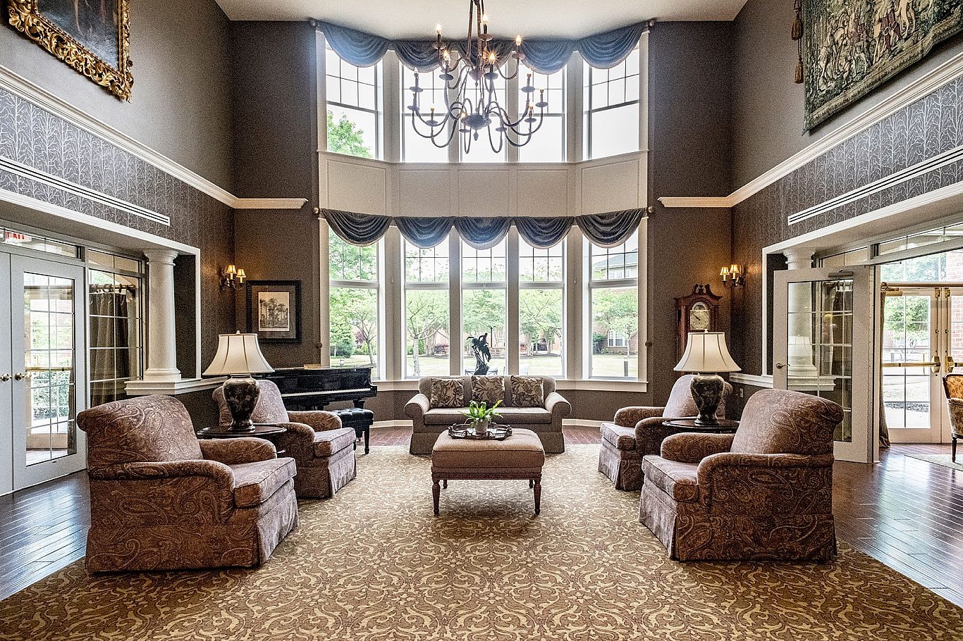 Beautiful interior lounge area with seating and large windows