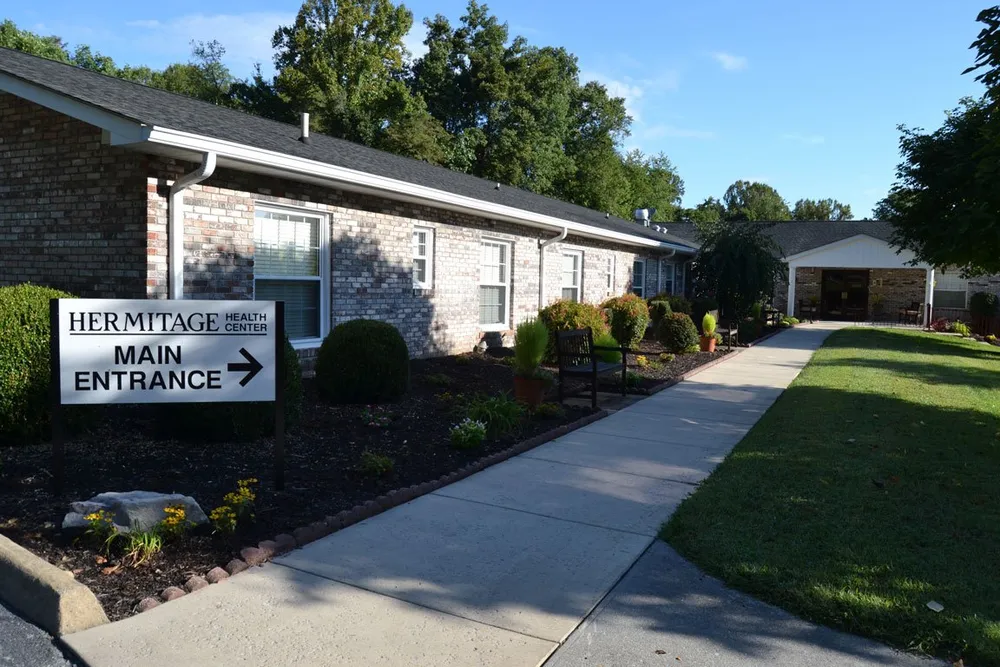 Exterior view of Hermitage Health Center with entrance sign