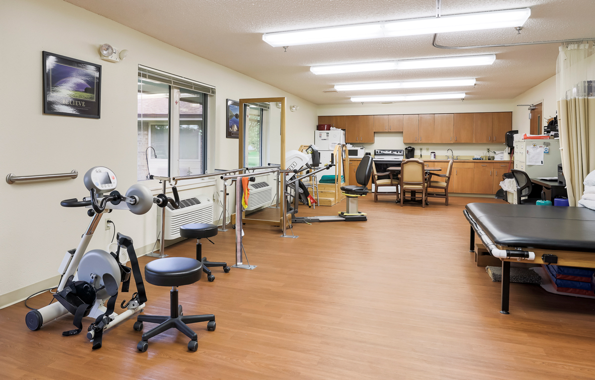 Rehabilitation room with equipment and seating