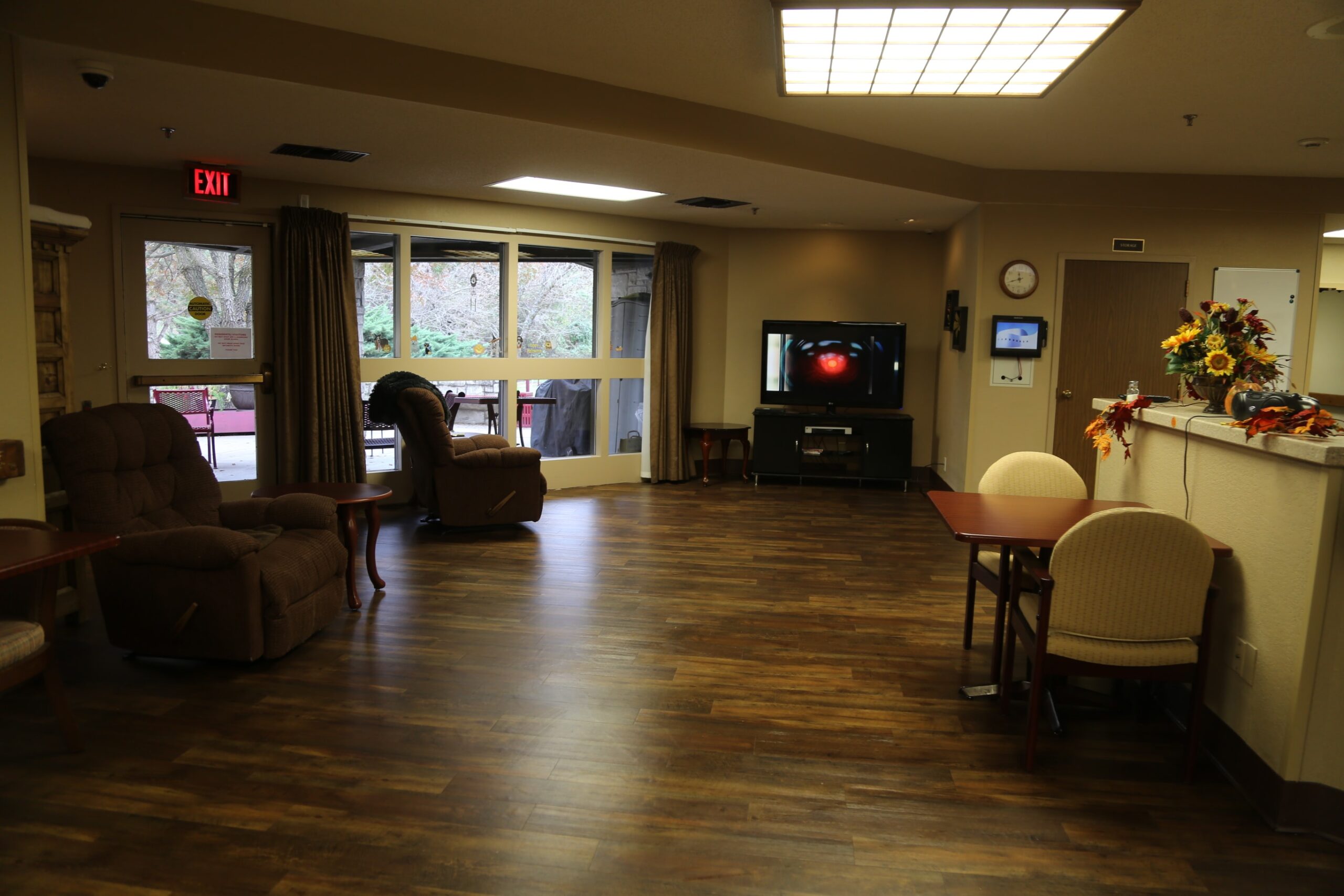 Common area with seating and a television