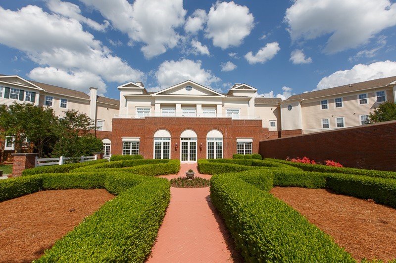 Exterior view of OakBridge Terrace with gardens