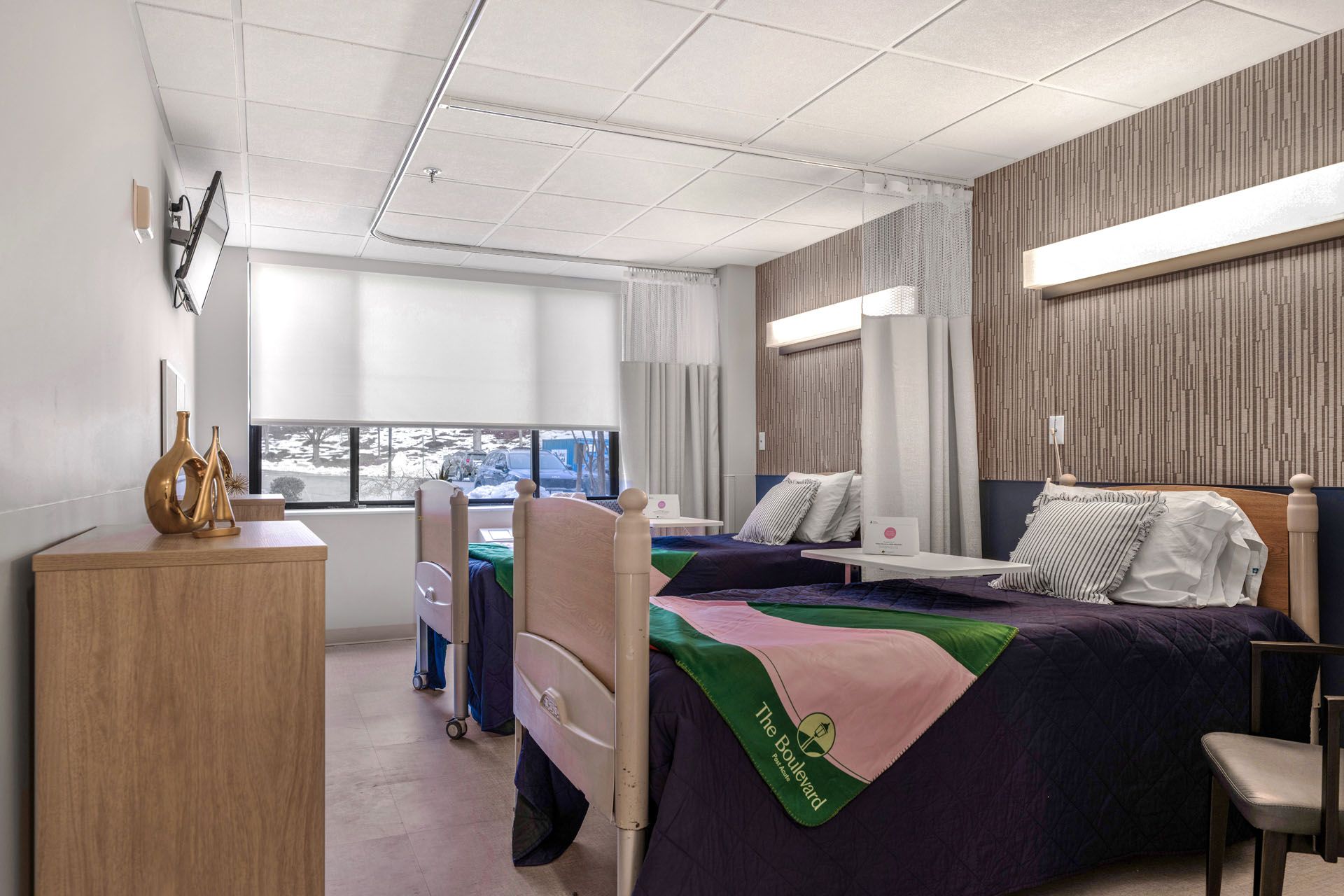 Shared resident room with beds and decor