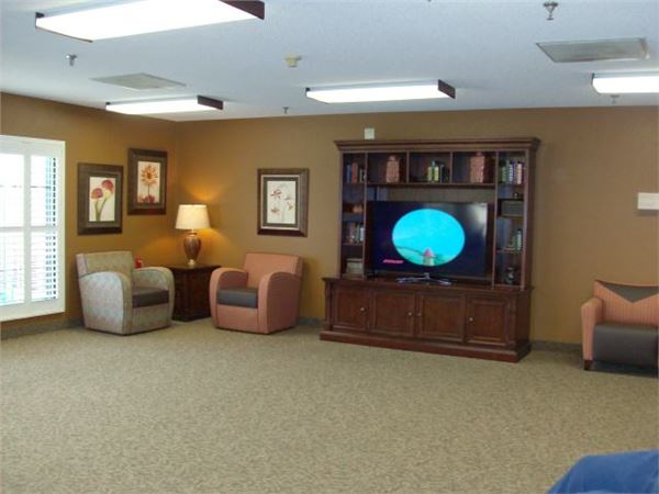 Common area with seating and television