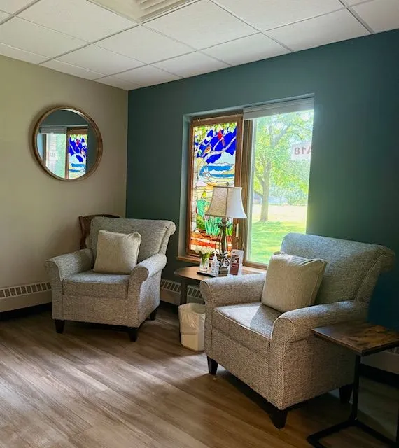 Cozy seating area with stained glass windows