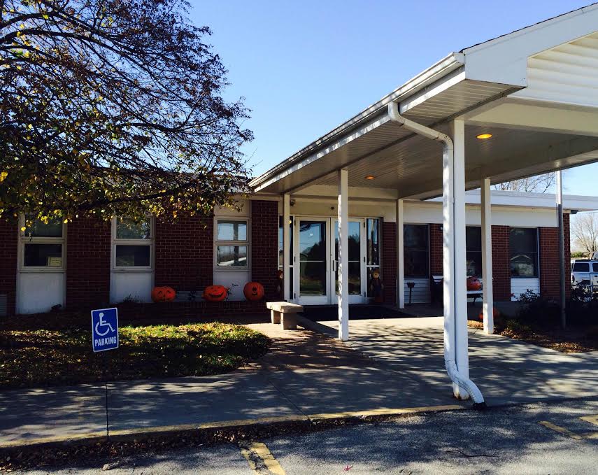 Entrance of Rose Haven Nursing Home with accessible parking