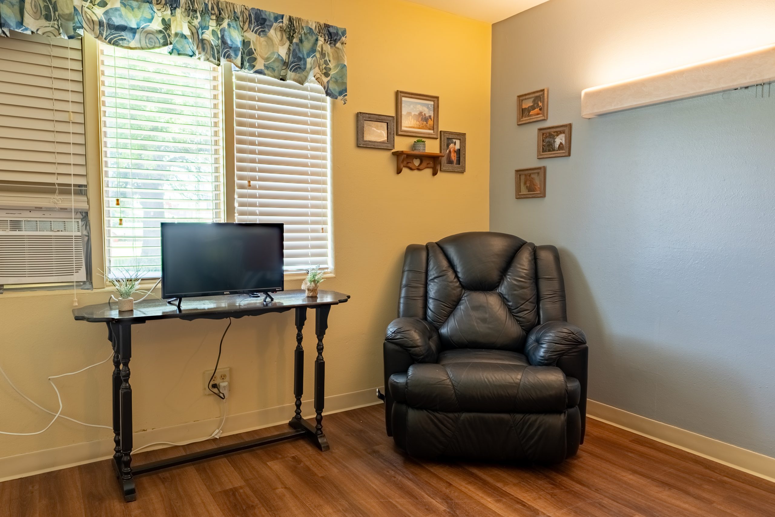 Cozy private room with chair and TV