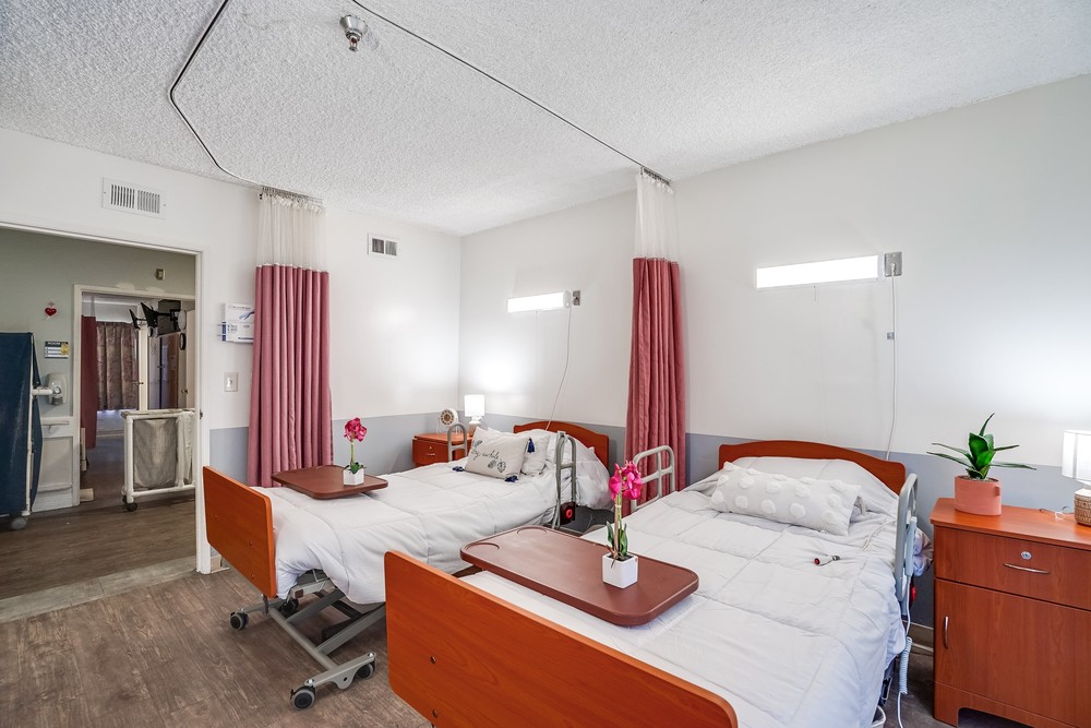 A well-equipped shared room in a senior care facility