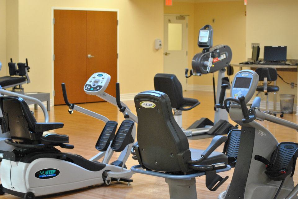 Fitness equipment in a well-lit exercise area