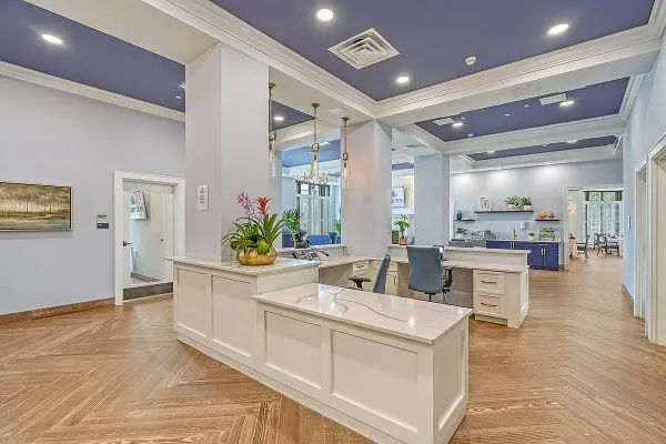 Sunny interior common area with a reception desk