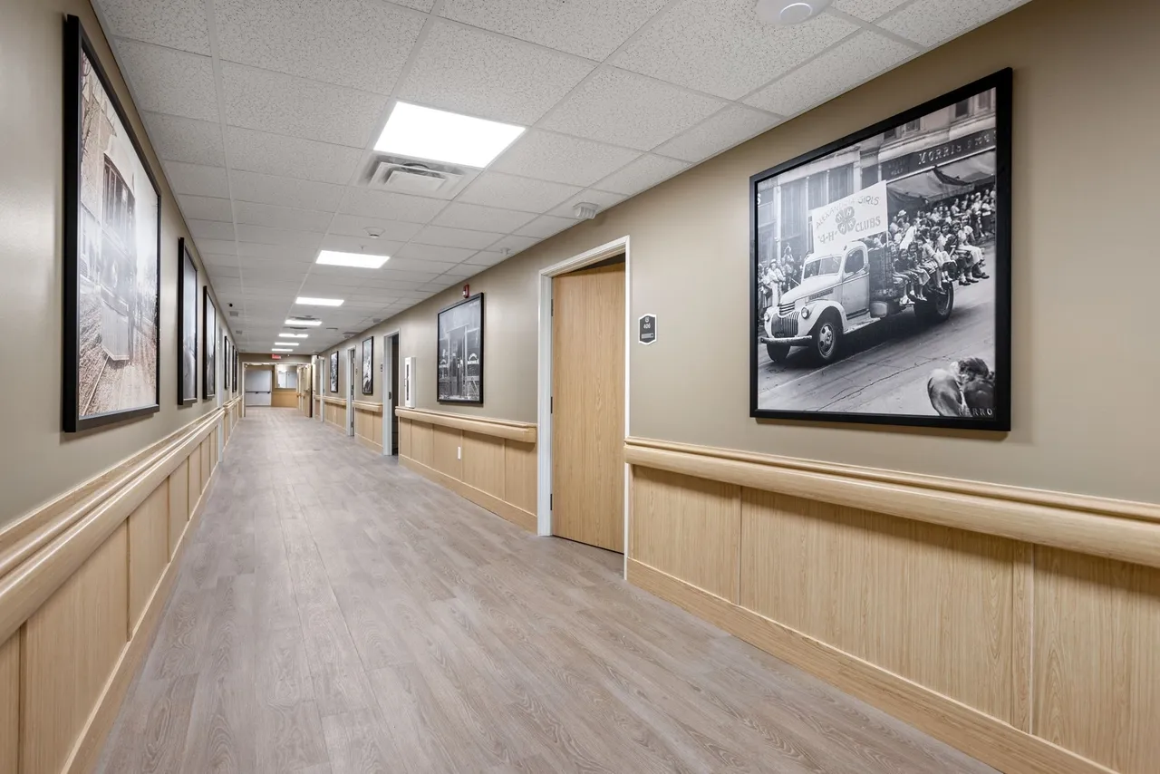 Hallway with framed pictures in a facility