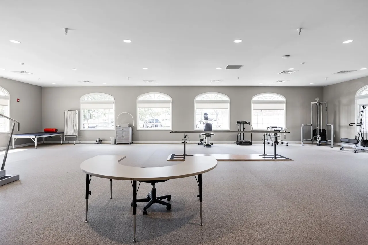 Interior view of a rehabilitation gym with equipment
