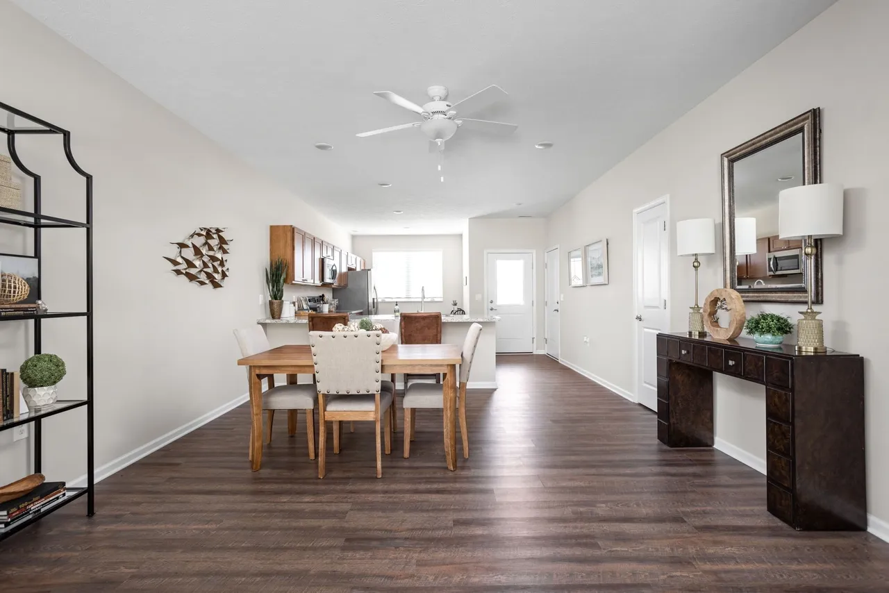 Bright dining area with wooden furniture