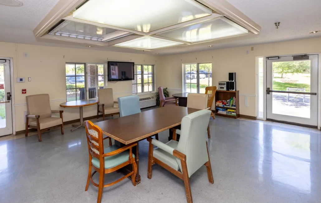 Bright common area with tables and chairs