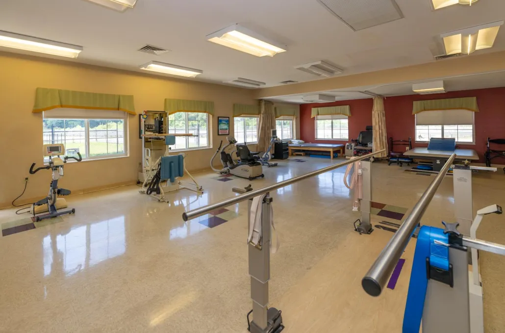 Physical therapy room with exercise equipment