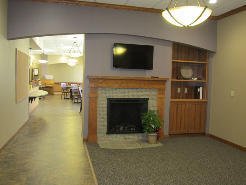 Interior view of a common area with a fireplace