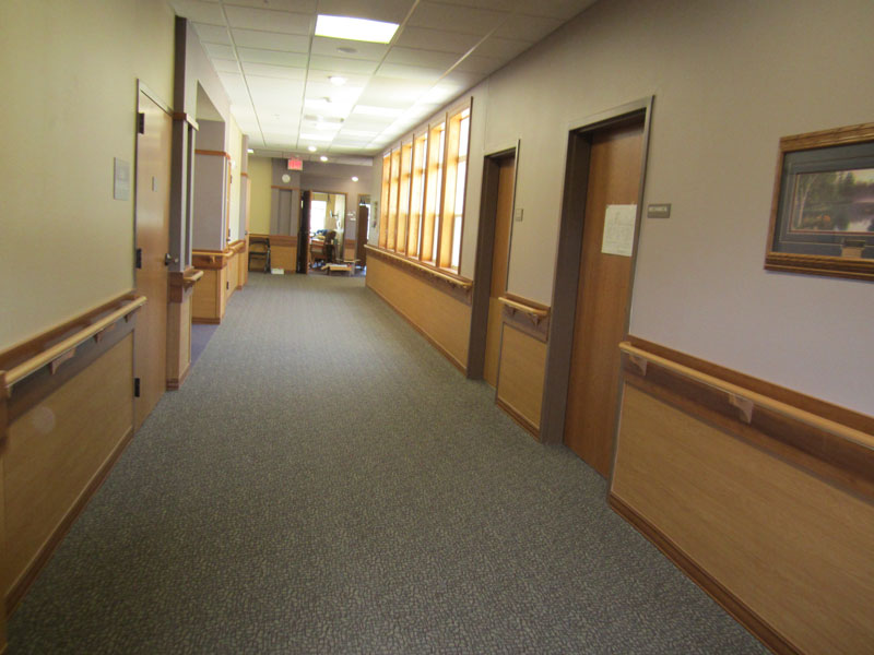 A wide hallway inside the facility