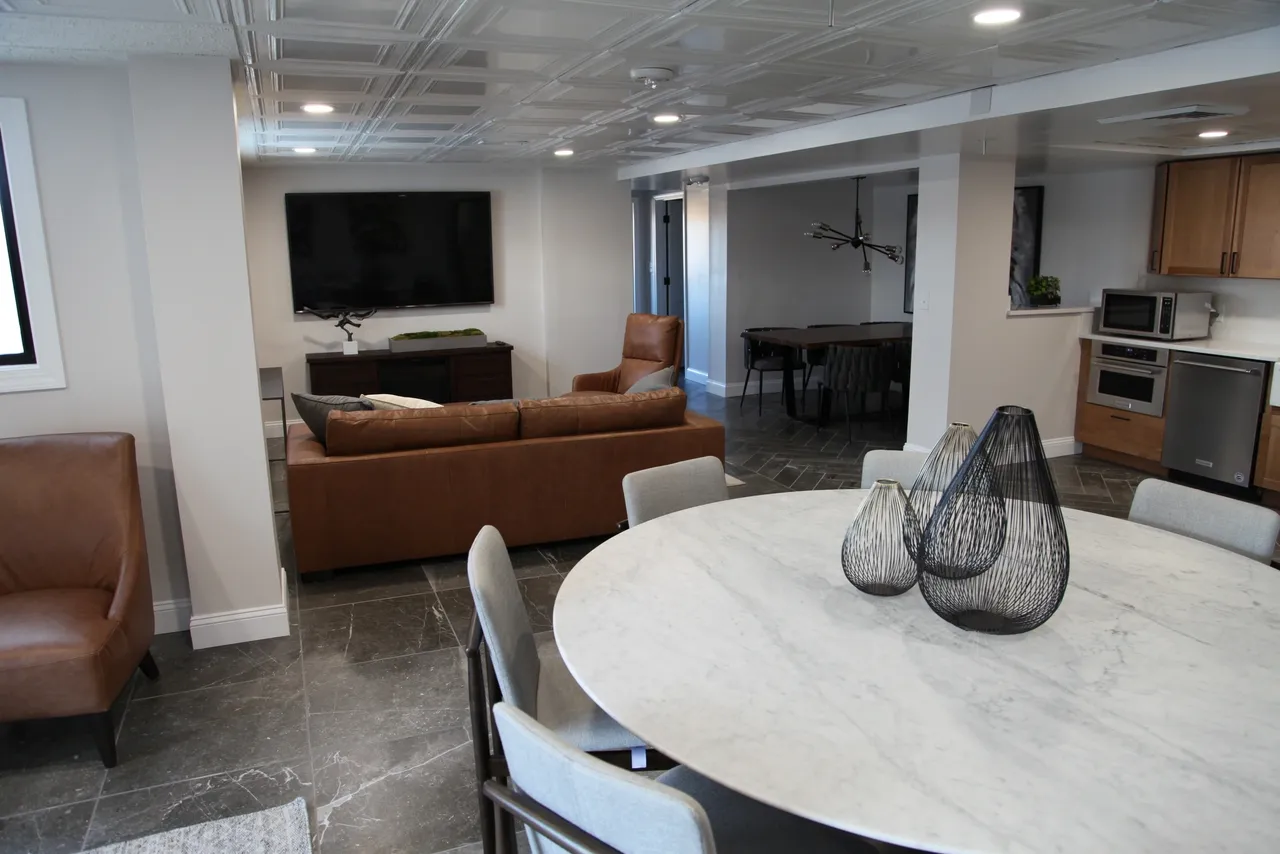 Modern common area with seating and dining table