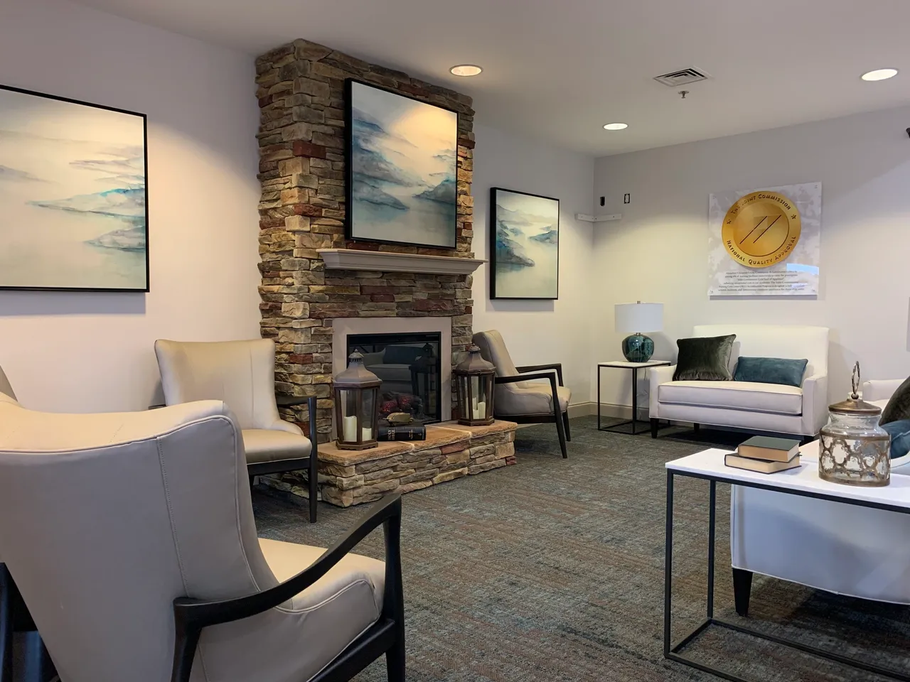 Cozy common area with seating and fireplace