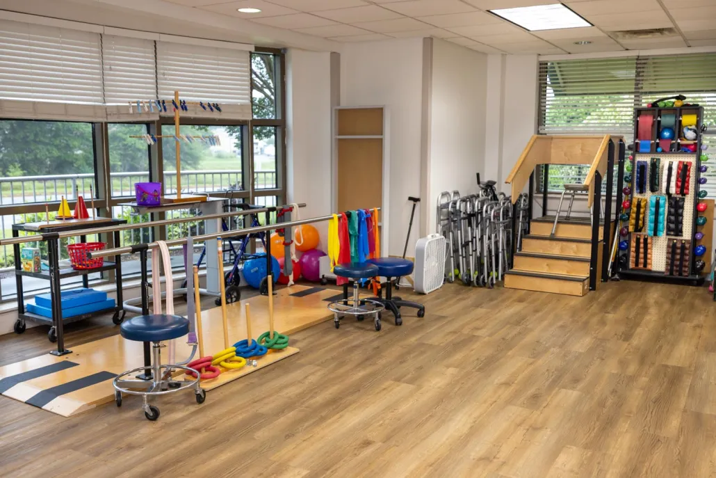 Interior therapy room with equipment and colorful props