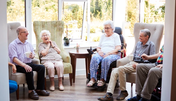 Residents enjoying time together in a common area.