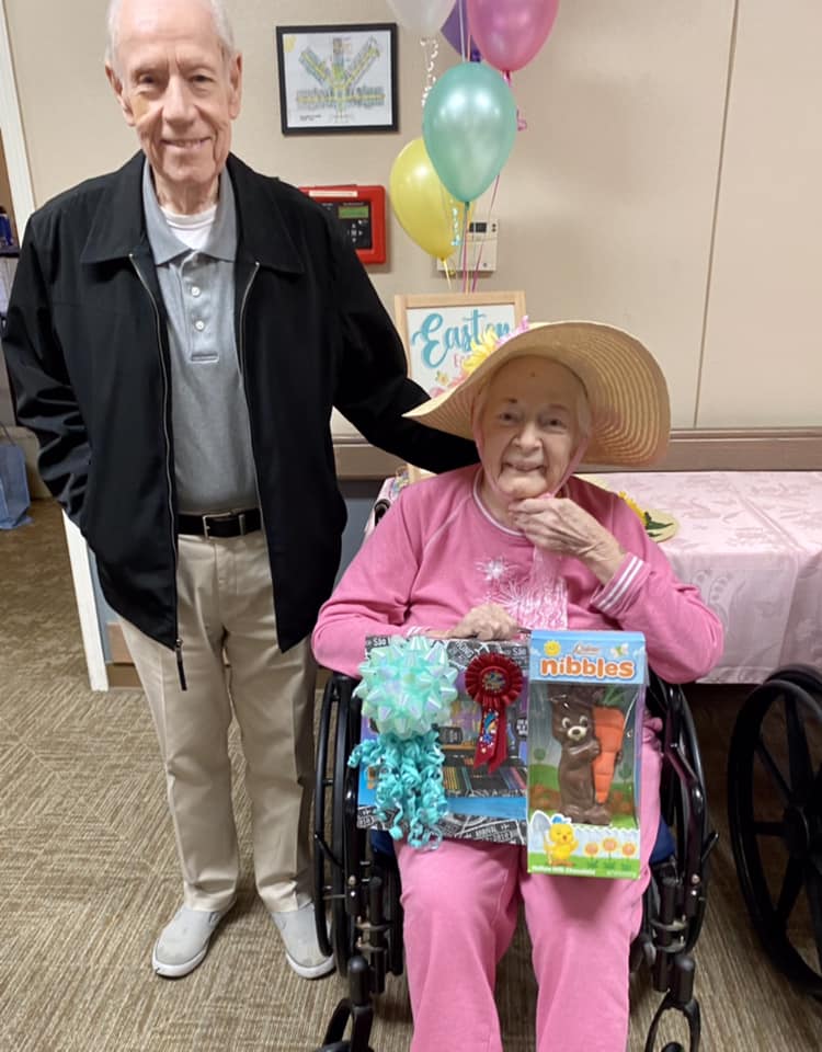 A celebration with residents and decorations.